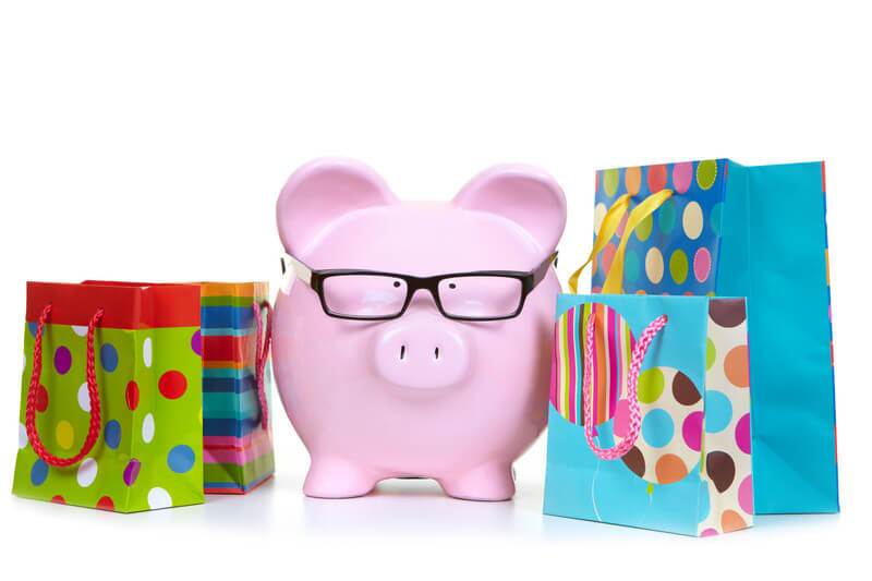 pink piggybank with gift packages either side representing the benefits of salary sacrificing to superannuation using salary packaging - superannuation investment benefits; or free super money with government co-contribution; considering superannuation structures