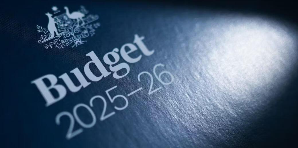 Title Page of the Australian government's March 2025 Federal Budget has the national crest above the words Budget 2025-26 printed in white lettering on a royal blue background