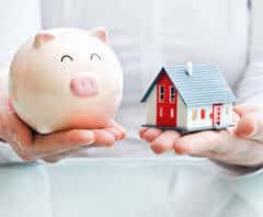 super asset represented by a pink piggy bank bigger than home equity - surplus savings help with mortgage debt management